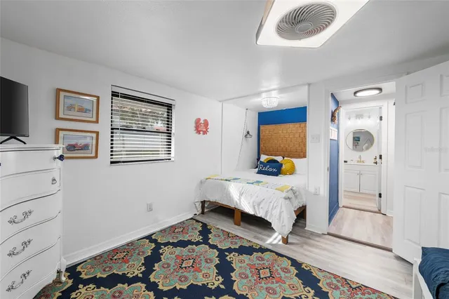 a view of room with furniture and flat screen tv