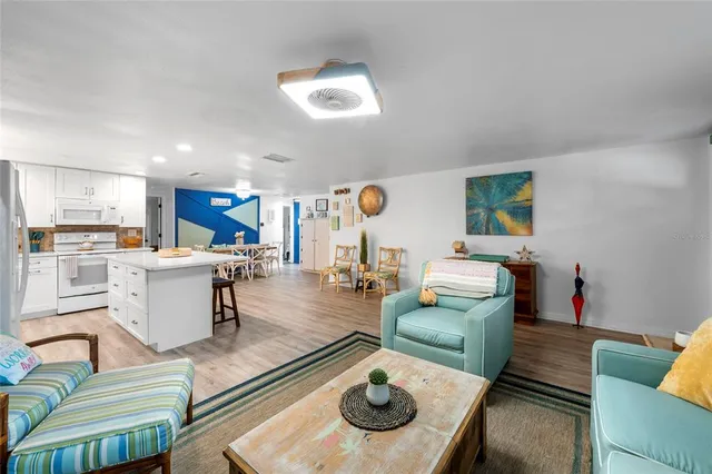 a view of kitchen with wooden floor