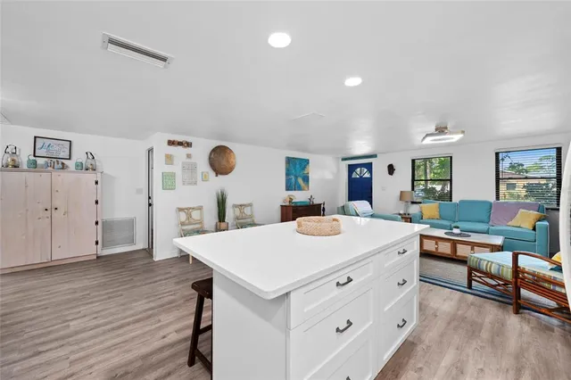 a kitchen with stainless steel appliances granite countertop a stove and a sink