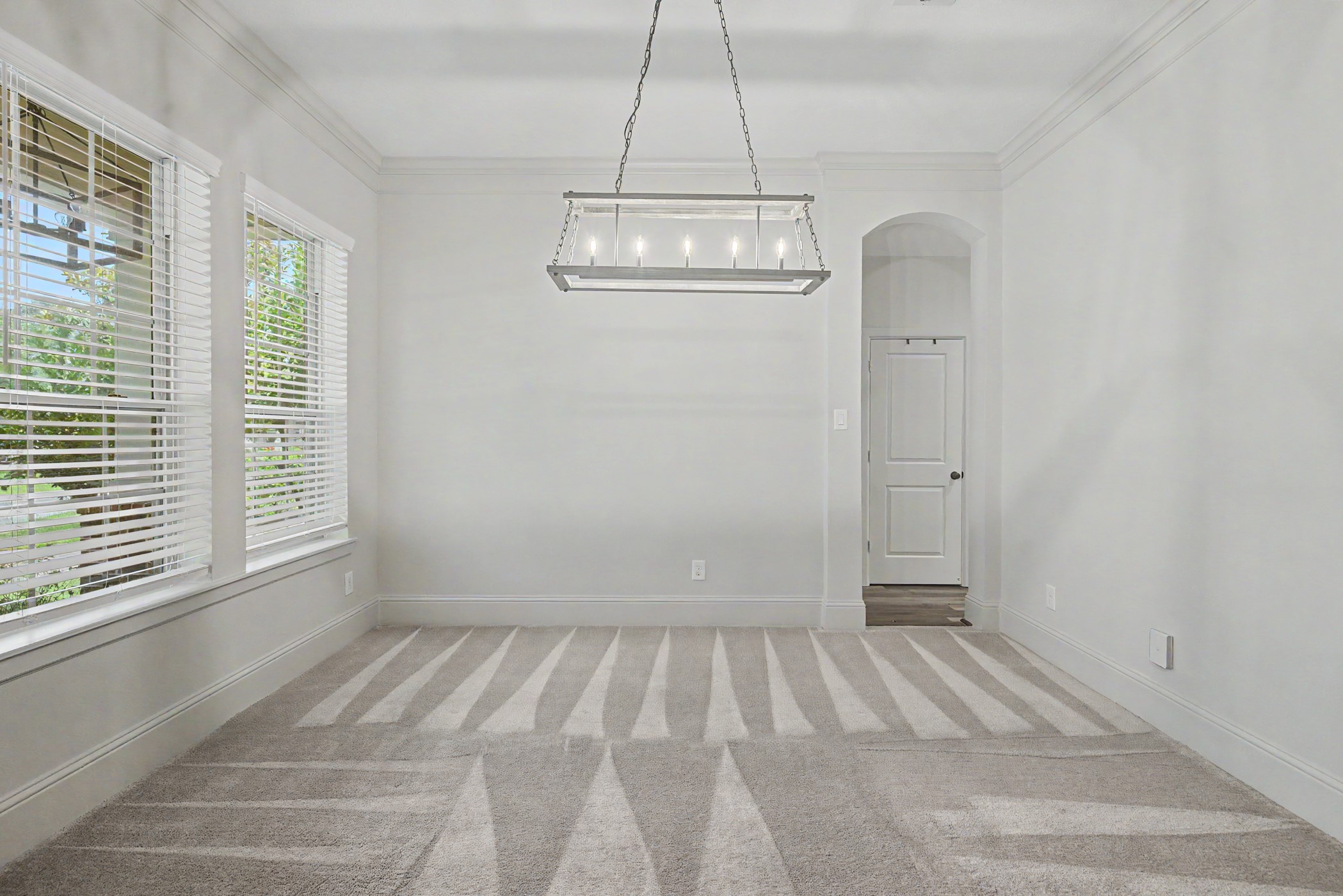 31032 Sunfall Trail Lane Spring, TX 77386 - Photo 4 of 39 a view of empty room with wooden floor and fan