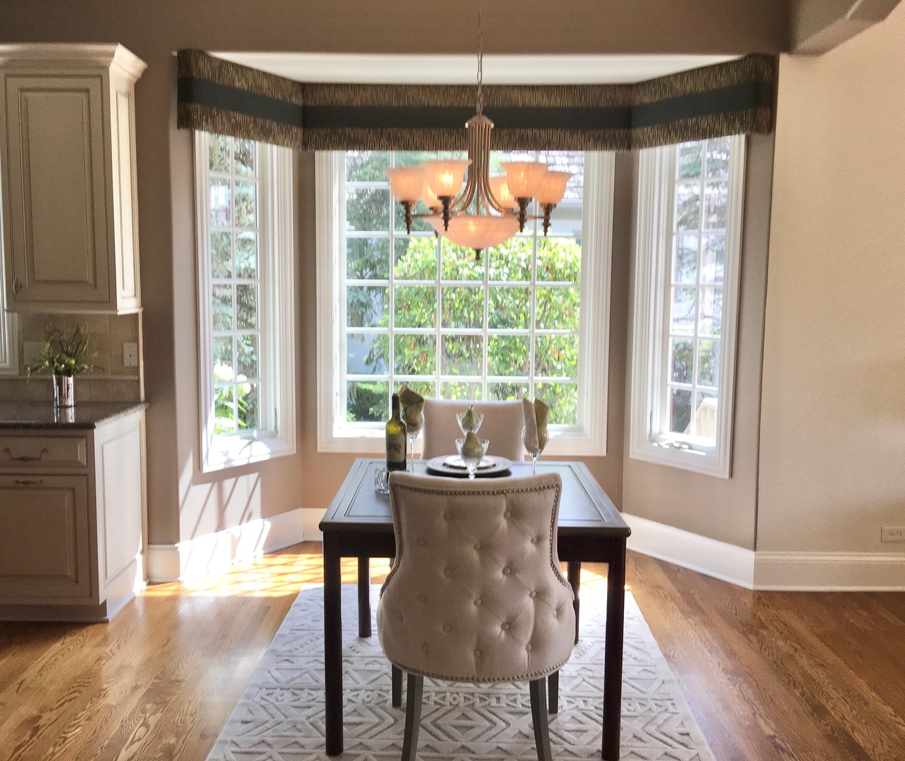 59 Forest Gate Circle Oak Brook, IL 60523 - Photo 11 of 30 a dining room with furniture and wooden floor