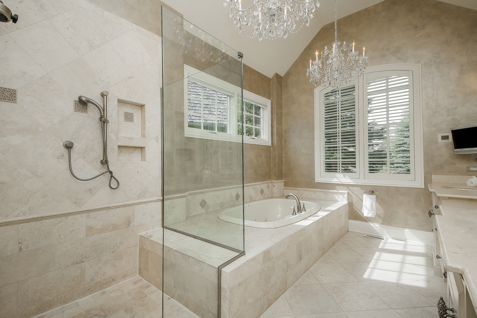 59 Forest Gate Circle Oak Brook, IL 60523 - Photo 19 of 30 a bathroom with a bathtub and shower