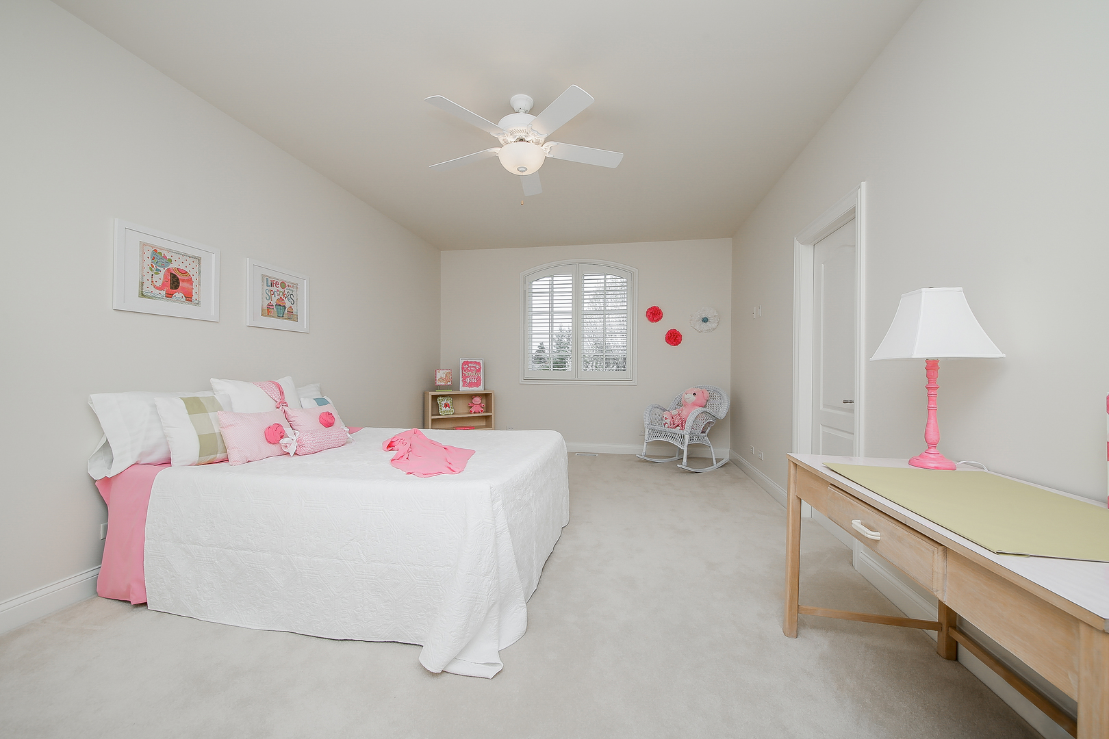 59 Forest Gate Circle Oak Brook, IL 60523 - Photo 21 of 30 a bedroom with a bed and a chandelier