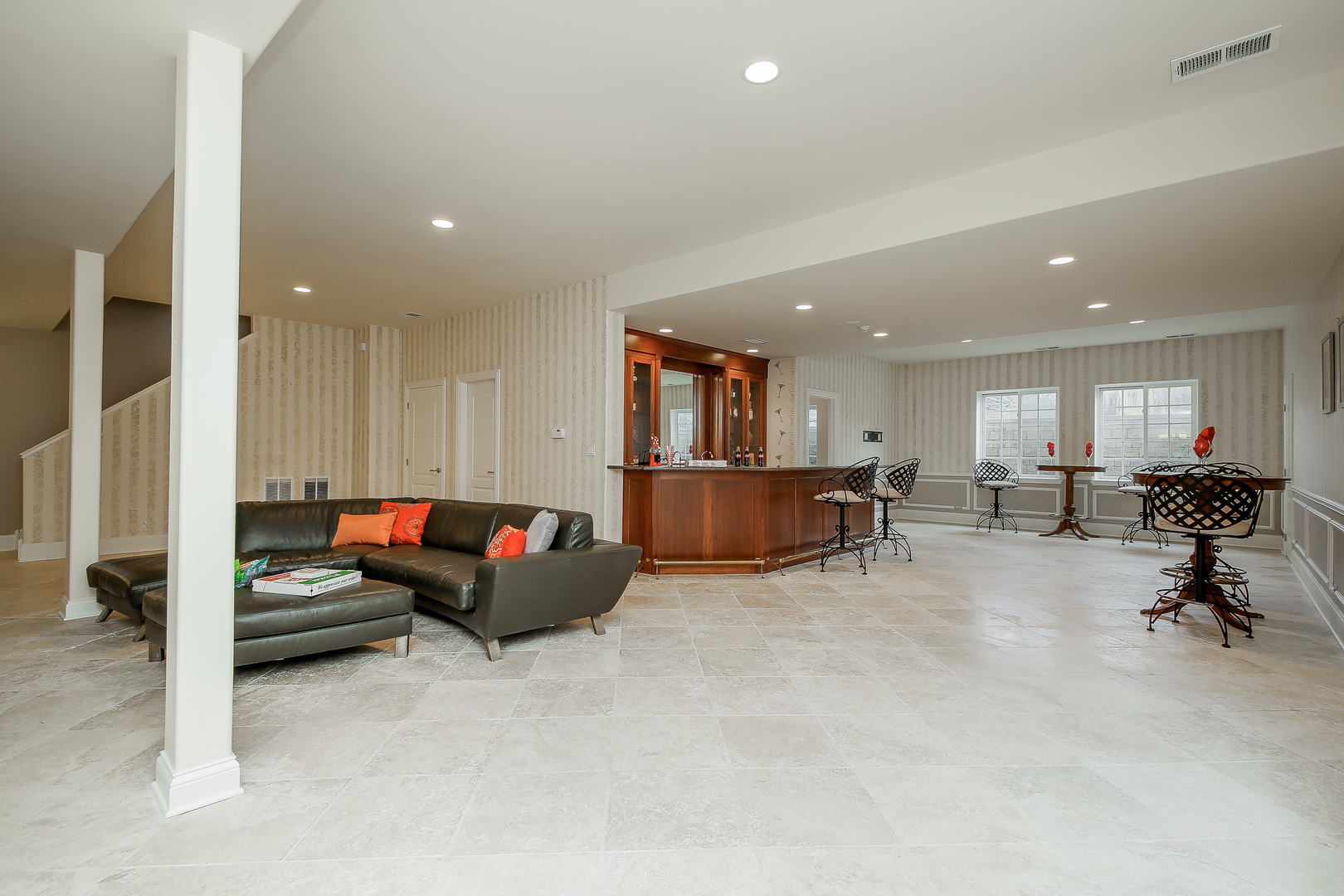 59 Forest Gate Circle Oak Brook, IL 60523 - Photo 26 of 30 a living room with furniture and a flat screen tv