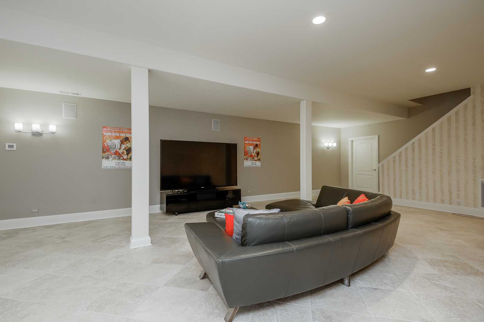 59 Forest Gate Circle Oak Brook, IL 60523 - Photo 27 of 30 a living room with furniture and a flat screen tv