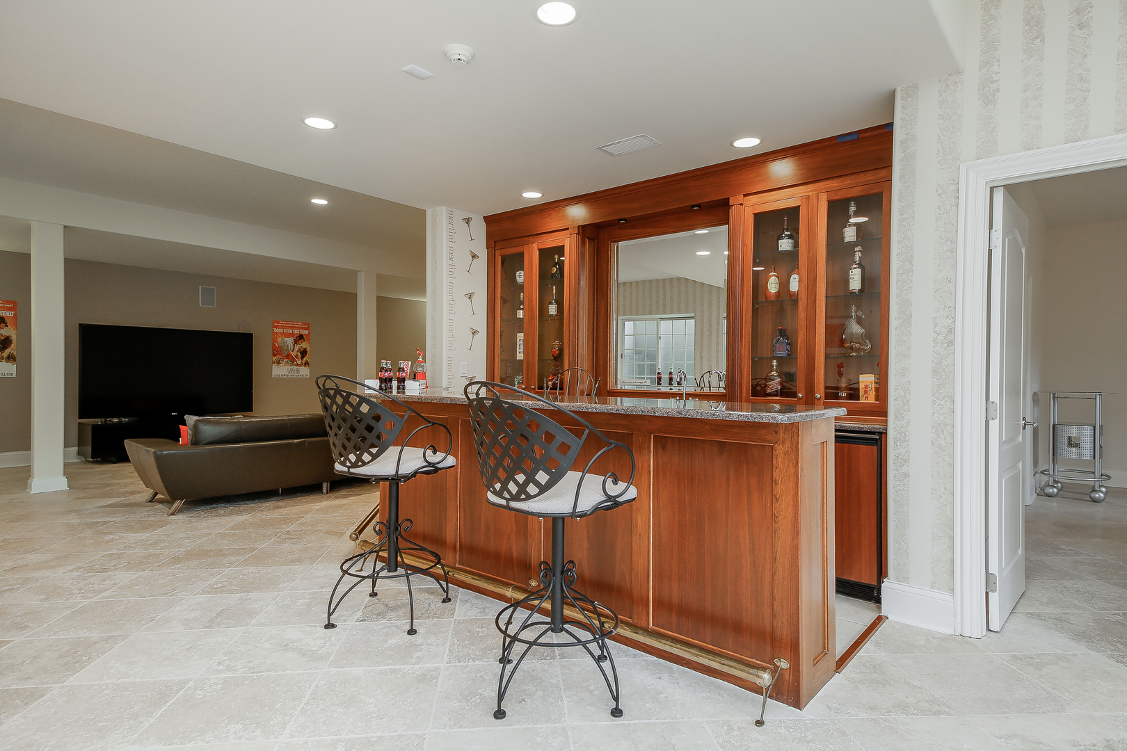 59 Forest Gate Circle Oak Brook, IL 60523 - Photo 28 of 30 a living room with furniture a flat screen tv and a large window