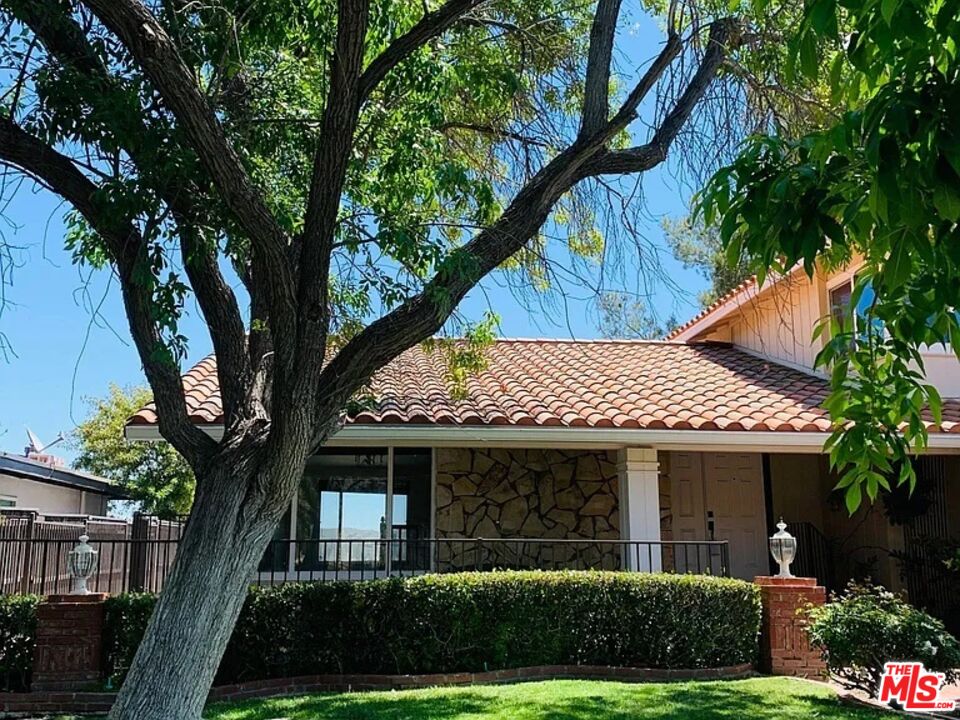 1096 Stoneshead Court Westlake Village, CA 91361 - Photo 29 of 38 a front view of a house with a yard