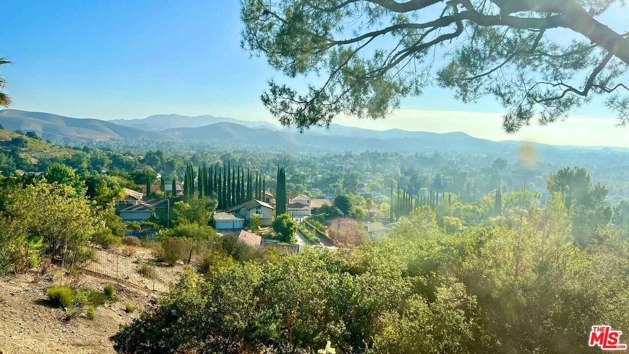 1096 Stoneshead Court Westlake Village, CA 91361 - Photo 36 of 38 a view of a forest with mountains in the background