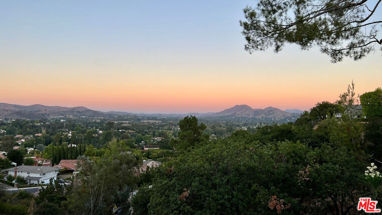1096 Stoneshead Court Westlake Village, CA 91361 - Photo 37 of 38 a view of a town with mountains in the background
