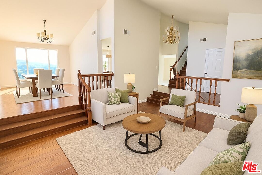 1096 Stoneshead Court Westlake Village, CA 91361 - Photo 5 of 38 a living room with furniture and a table
