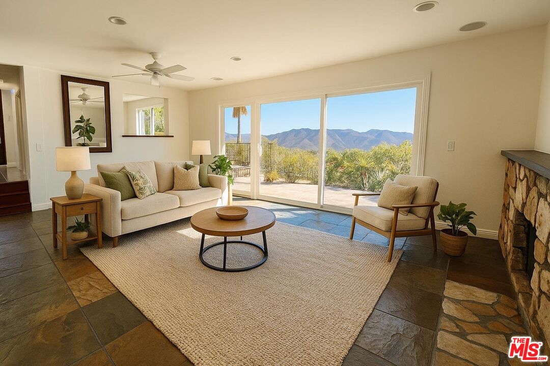 1096 Stoneshead Court Westlake Village, CA 91361 - Photo 7 of 38 a living room with furniture and a large window