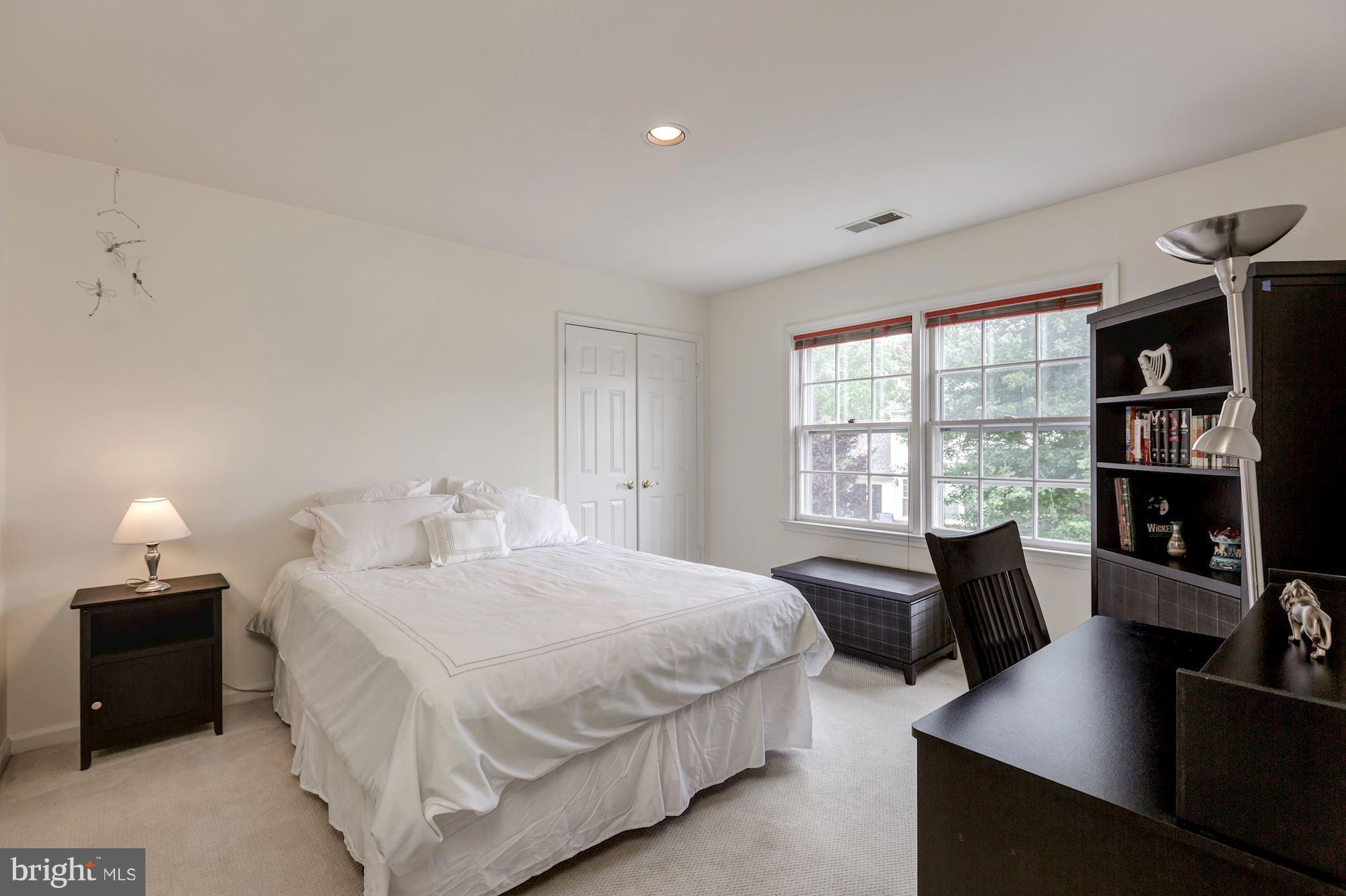 8745 Hickory Bend Trail Potomac, MD 20854 - Photo 18 of 30 a bedroom with a bed and a couch