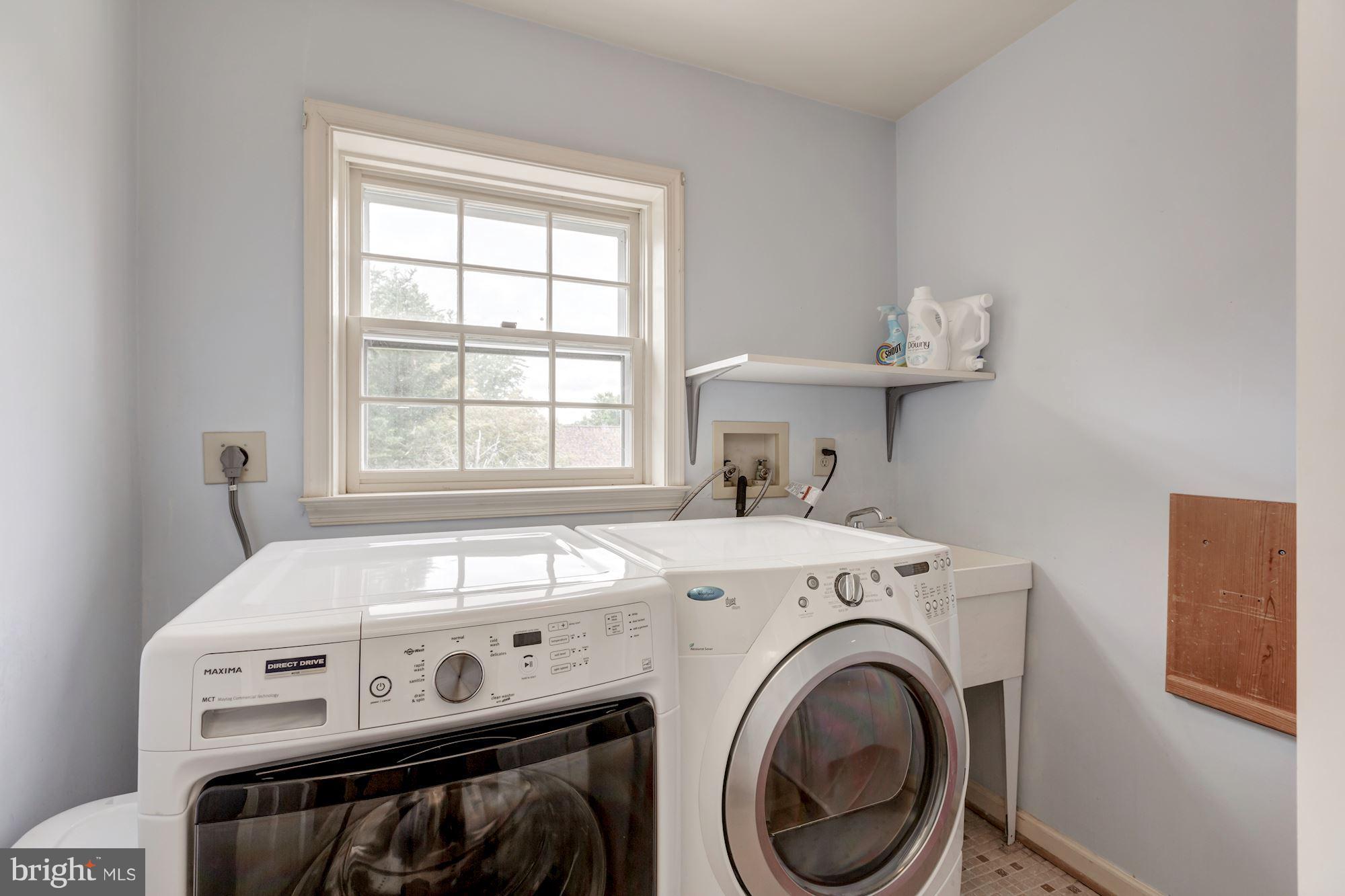 8745 Hickory Bend Trail Potomac, MD 20854 - Photo 21 of 30 a utility room with dryer and washer