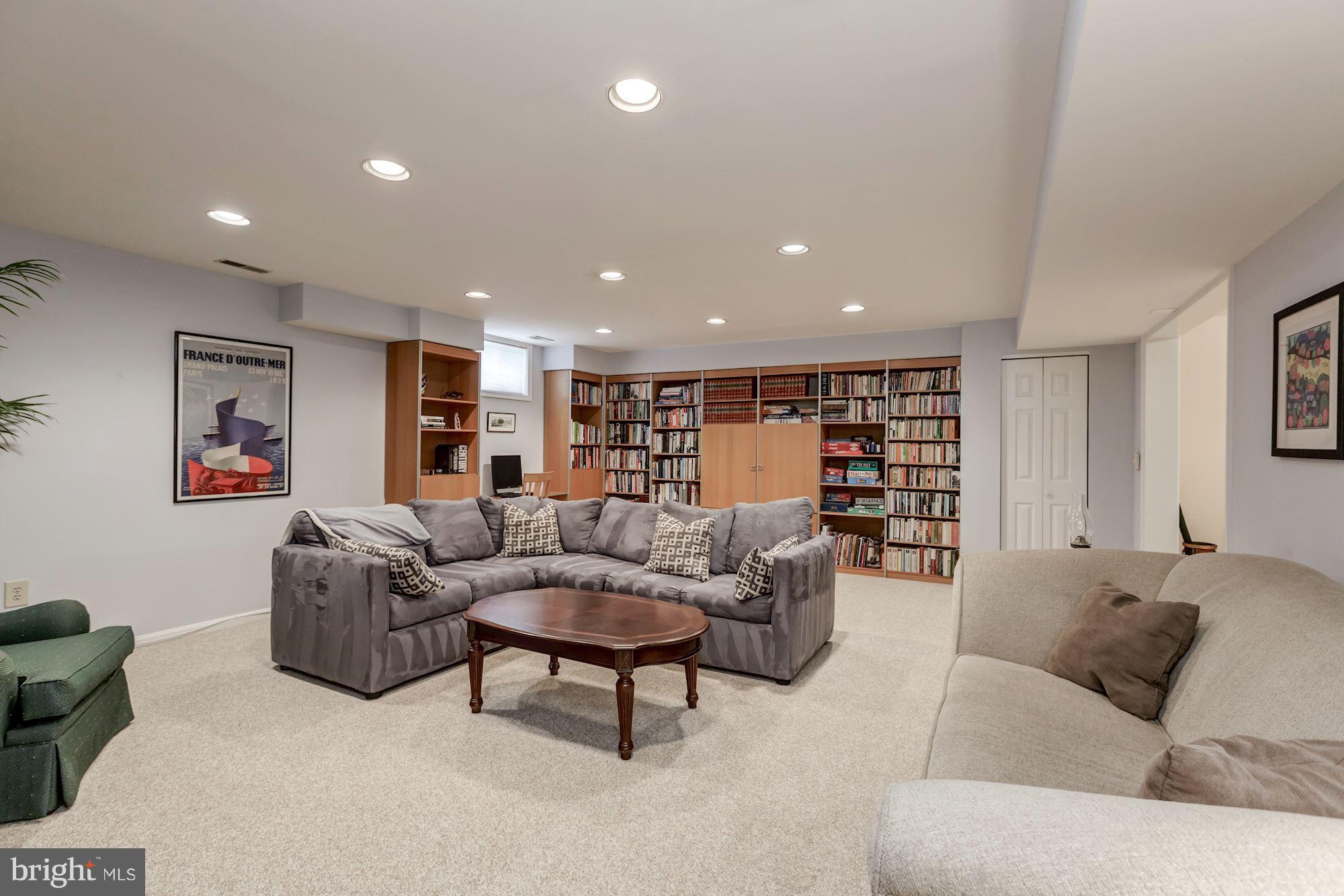 8745 Hickory Bend Trail Potomac, MD 20854 - Photo 24 of 30 a living room with furniture and a couch