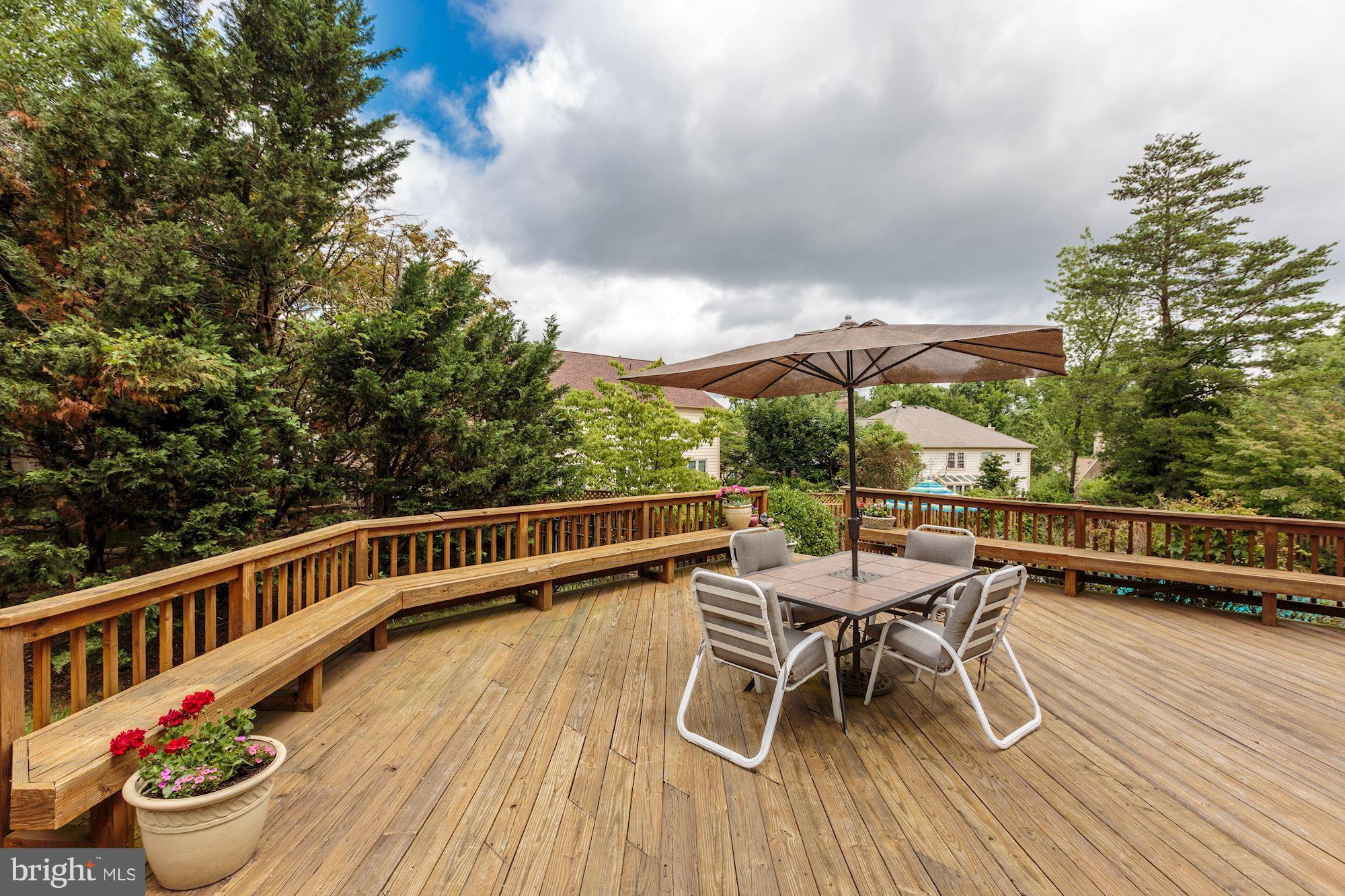 8745 Hickory Bend Trail Potomac, MD 20854 - Photo 27 of 30 a view of a chairs and table on the wooden floor