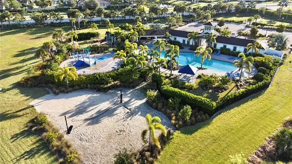 an aerial view of residential building with parking space