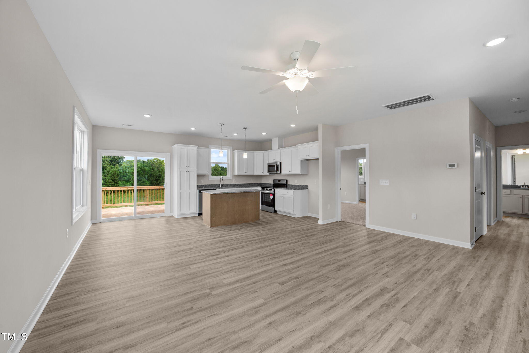 140 Brookhaven Drive Spring Hope, NC 27882 - Photo 13 of 32 a view of a kitchen with a sink and a window
