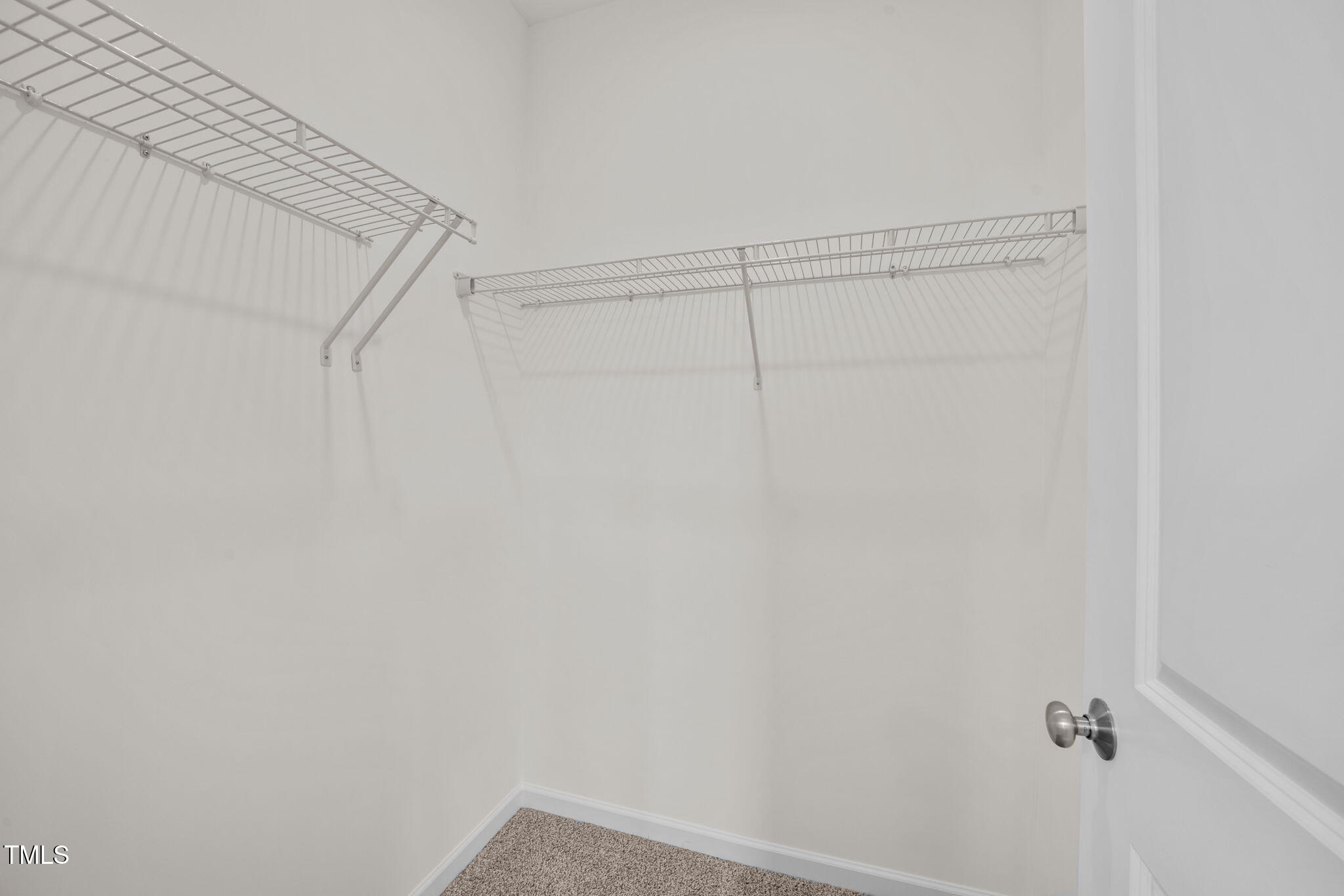 140 Brookhaven Drive Spring Hope, NC 27882 - Photo 18 of 32 a view of small space with racks on the wall