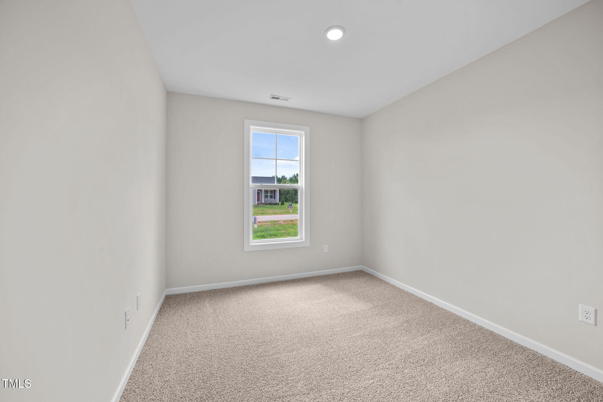 140 Brookhaven Drive Spring Hope, NC 27882 - Photo 19 of 32 an empty room with a window