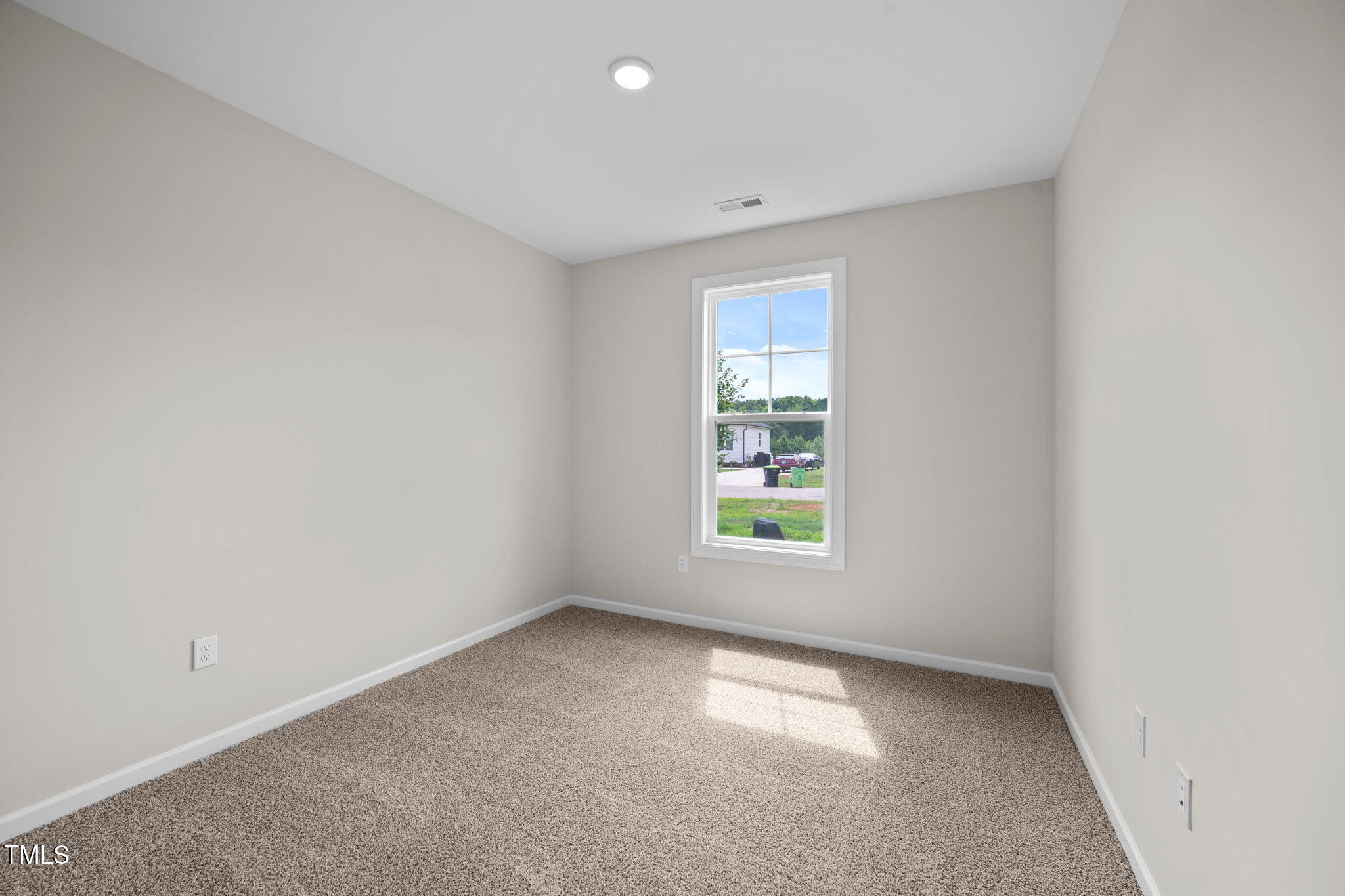 140 Brookhaven Drive Spring Hope, NC 27882 - Photo 22 of 32 an empty room with windows