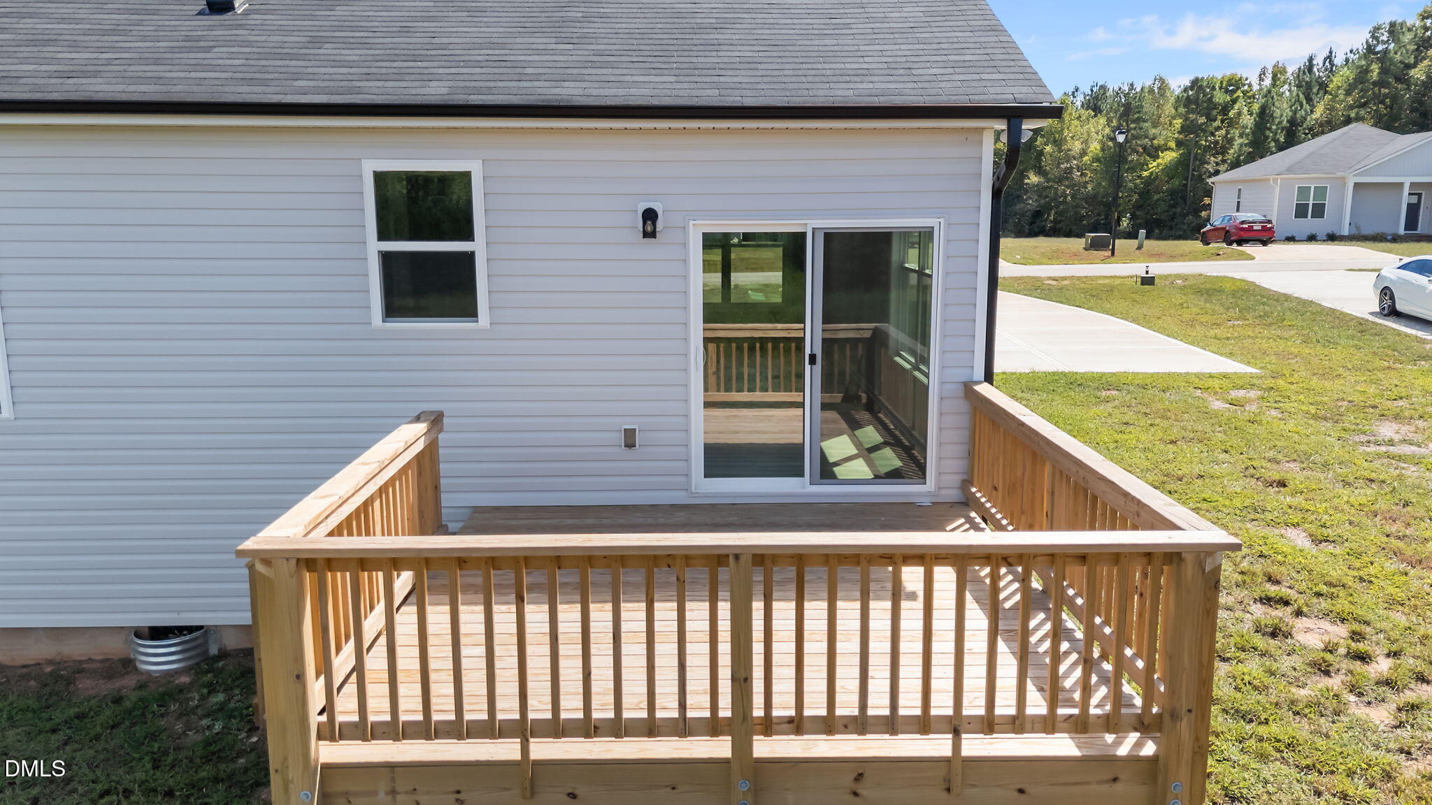 140 Brookhaven Drive Spring Hope, NC 27882 - Photo 25 of 32 a view of swimming pool with two chairs in front of a house