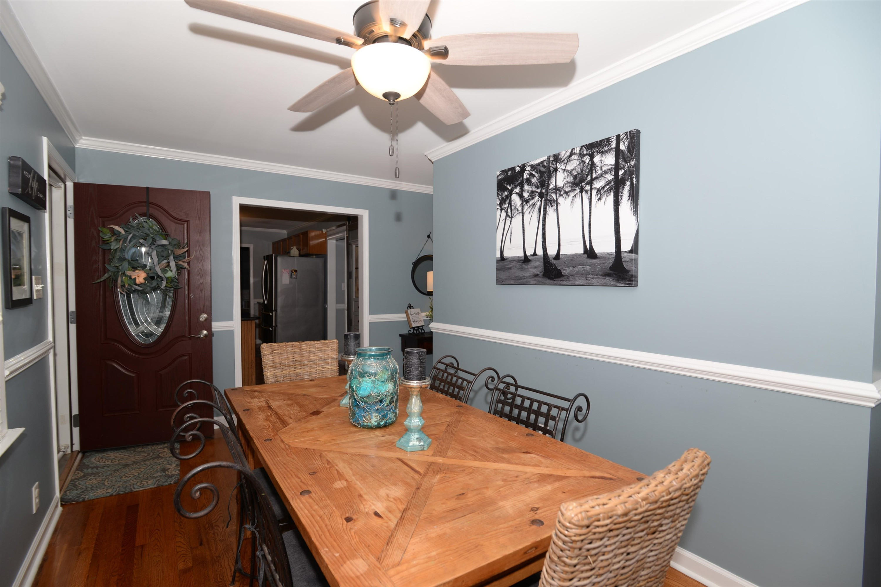 1023 Legend Road Raleigh, NC 27603 - Photo 5 of 30 This dining room features chair railing and beautiful crown molding. Dining Room