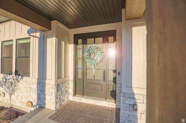 126 North 800 West Mapleton, UT 84664 - Photo 12 of 79 View of exterior entry with stone siding and a porch