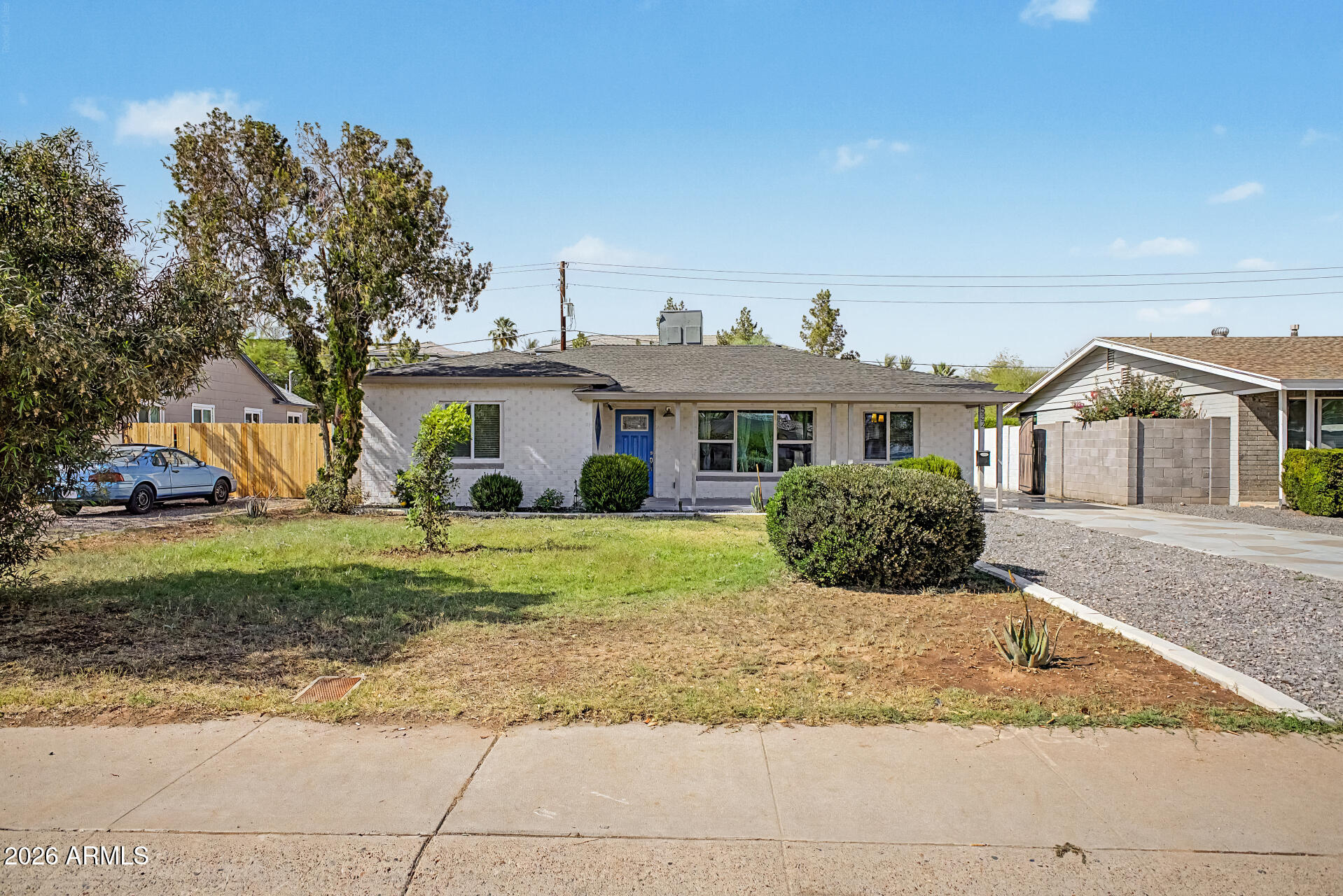 532 East Cheery Lynn Road Phoenix, AZ 85014 - Photo 2 of 37 a front view of a house with a yard