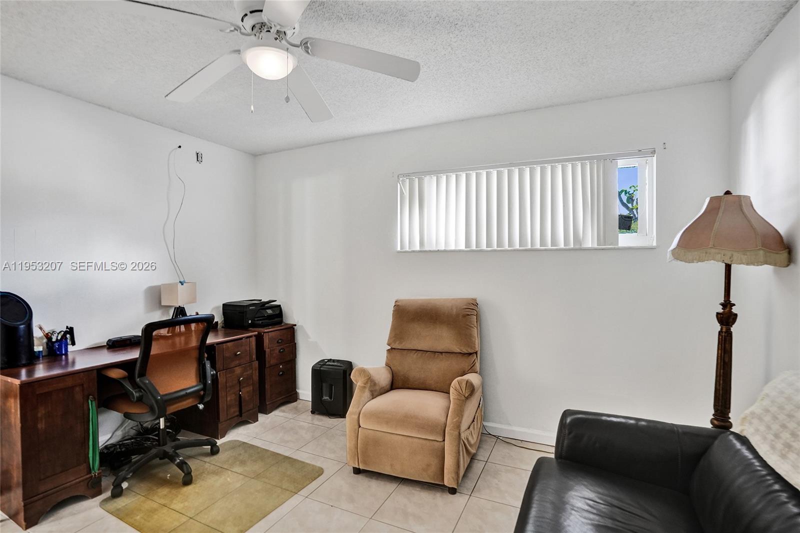 3511 Inverrary Drive, Unit 107 Lauderhill, FL 33319 - Photo 17 of 47 a living room with furniture