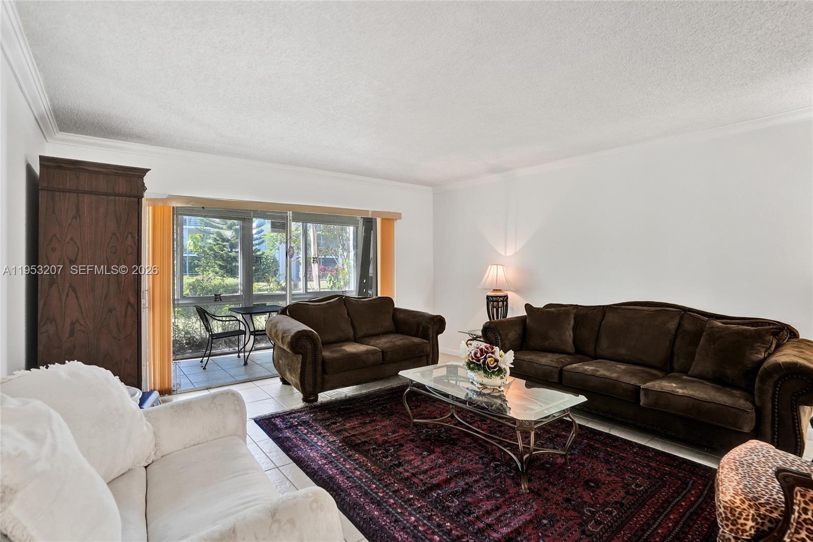3511 Inverrary Drive, Unit 107 Lauderhill, FL 33319 - Photo 24 of 47 a living room with furniture and a couch