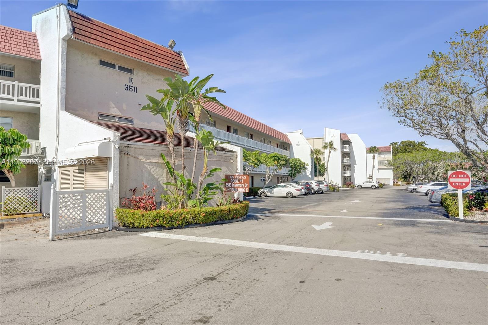 3511 Inverrary Drive, Unit 107 Lauderhill, FL 33319 - Photo 3 of 47 a view of a building along a street