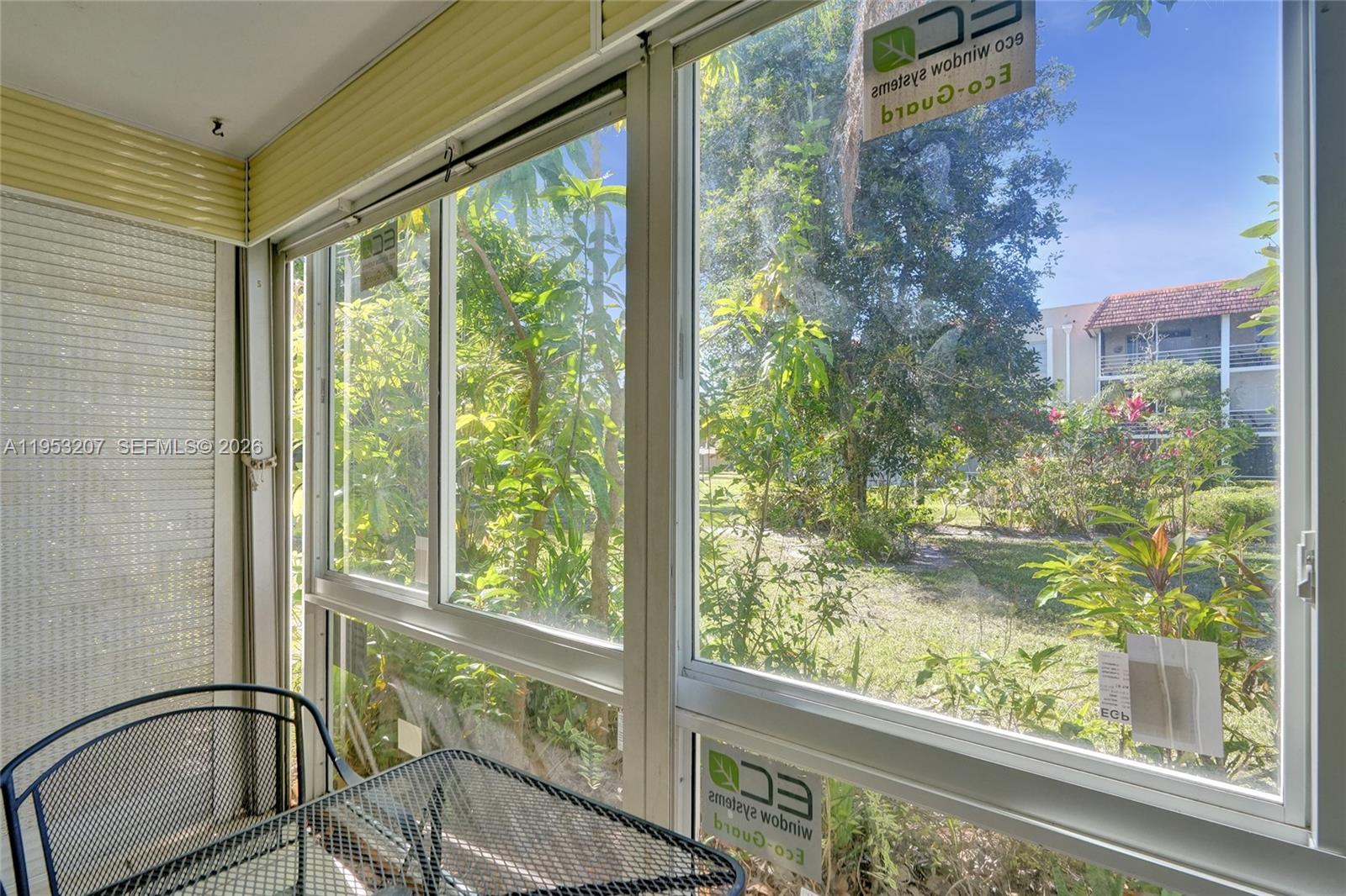 3511 Inverrary Drive, Unit 107 Lauderhill, FL 33319 - Photo 35 of 47 a view of a balcony with chair and the porch