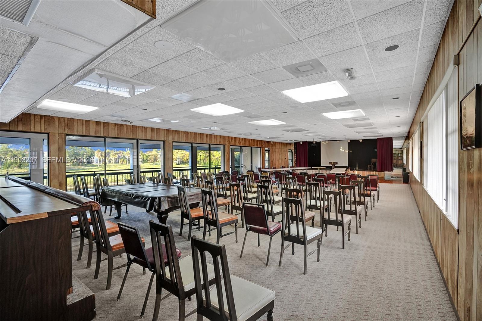 3511 Inverrary Drive, Unit 107 Lauderhill, FL 33319 - Photo 42 of 47 a view of a dining room with furniture window and outside view