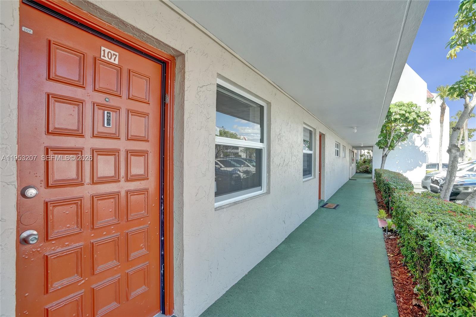 3511 Inverrary Drive, Unit 107 Lauderhill, FL 33319 - Photo 7 of 47 a view of a brick house with a large window