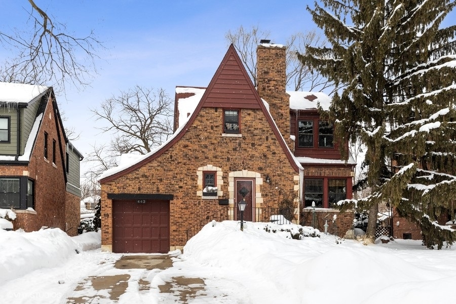 442 Kent Road Riverside, IL 60546 - Photo 2 of 45 a view of a house with a yard covered in snow