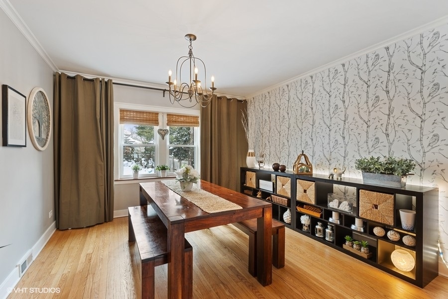 442 Kent Road Riverside, IL 60546 - Photo 14 of 45 a view of a dining room with furniture window and wooden floor