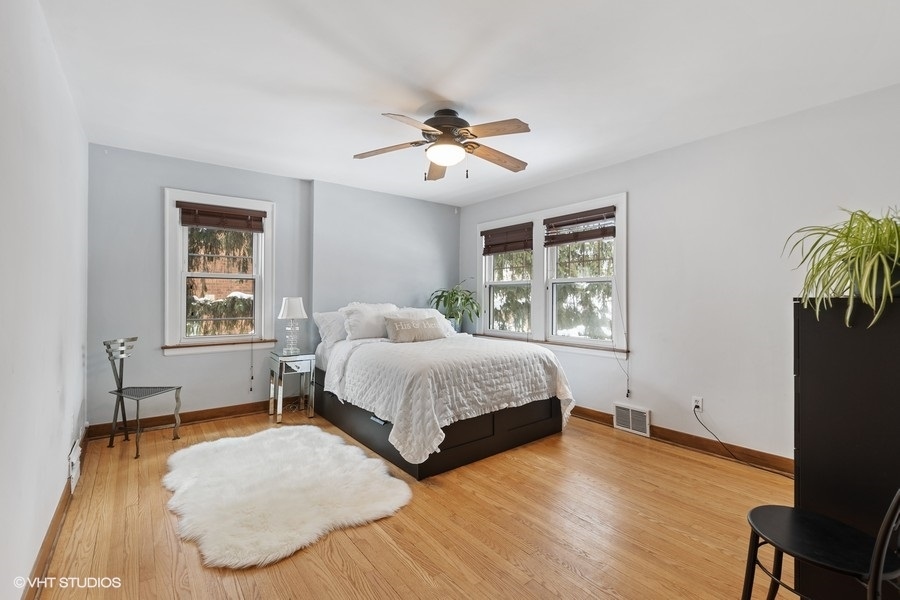 442 Kent Road Riverside, IL 60546 - Photo 25 of 45 a spacious bedroom with a bed and a window