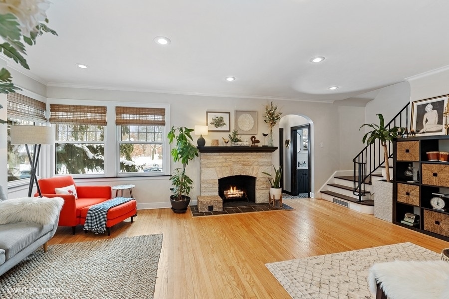 442 Kent Road Riverside, IL 60546 - Photo 5 of 45 a living room with furniture and a fireplace