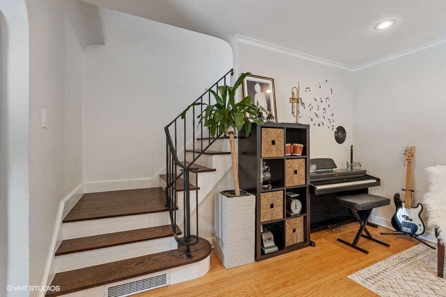 442 Kent Road Riverside, IL 60546 - Photo 9 of 45 a view of entryway with wooden floor and stairs