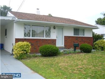 626 Polk Street Riverside, NJ 08075 - Photo 2 of 12 a front view of a house with garden