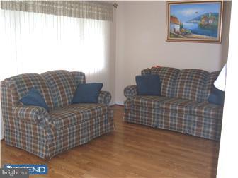 626 Polk Street Riverside, NJ 08075 - Photo 4 of 12 a living room with furniture