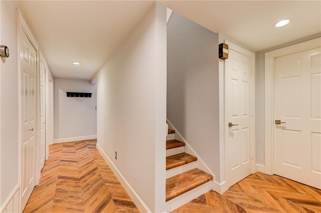2075 Clairmeade Valley Road Northeast Atlanta, GA 30329 - Photo 43 of 51 a view of a hallway with wooden floor and entryway