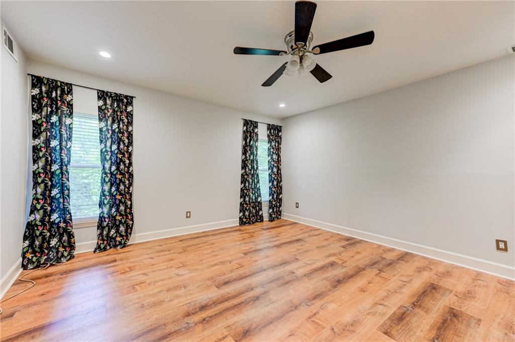2075 Clairmeade Valley Road Northeast Atlanta, GA 30329 - Photo 45 of 51 a view of an empty room with potted plants