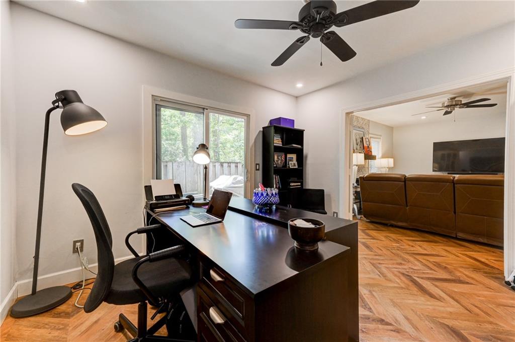 2075 Clairmeade Valley Road Northeast Atlanta, GA 30329 - Photo 6 of 51 a view of a workspace with furniture