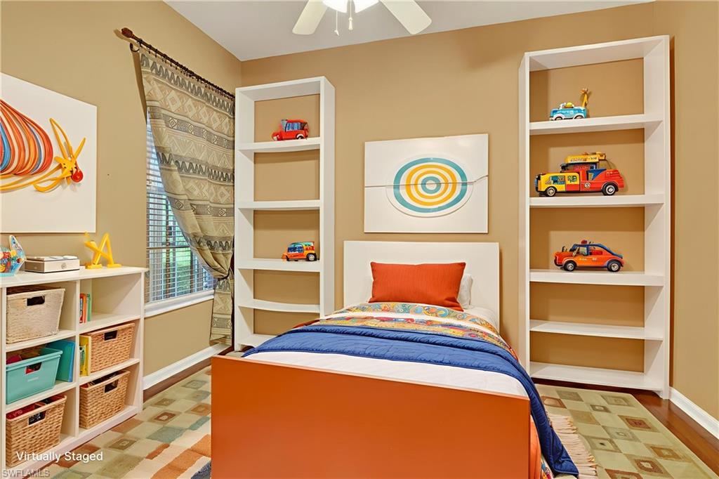 5902 Bermuda Lane Naples, FL 34119 - Photo 22 of 50 a bedroom with a bed and a window