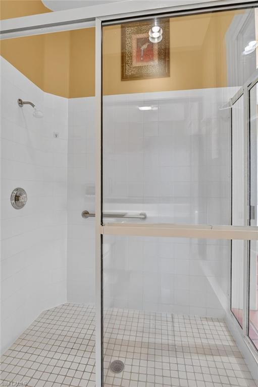 5902 Bermuda Lane Naples, FL 34119 - Photo 36 of 50 a bathroom with a shower