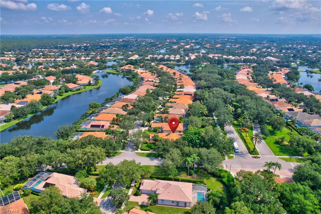 5902 Bermuda Lane Naples, FL 34119 - Photo 49 of 50 an aerial view of residential houses with outdoor space and trees