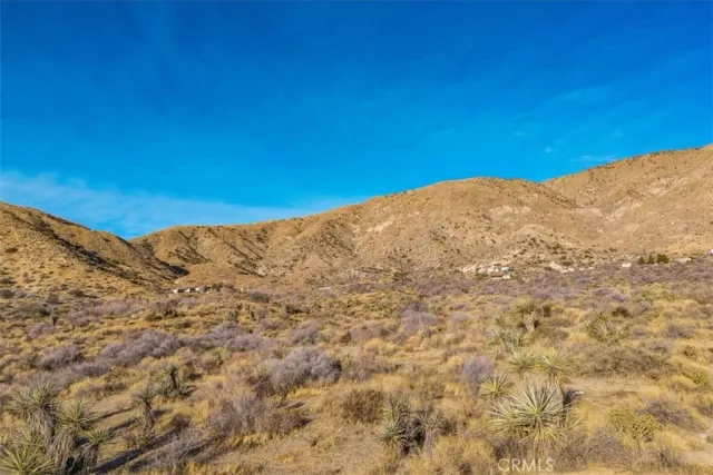 a view of a big room with mountain view