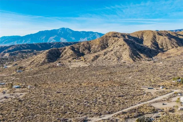 a view of ocean and a mountain
