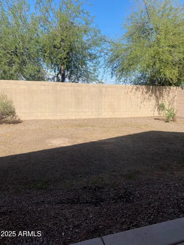 a view of an ocean and a yard